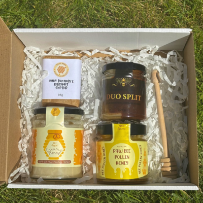 An example image of our Honey Lovers Gift Box with 3 jars of local honey, a soothing honey, rosemary and bergamot soap bar and a honey dipper